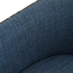 Poltrona girevole accent in lino imbottita con borchie, stile moderno