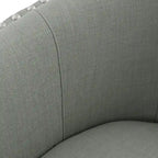 Poltrona girevole accent in lino imbottita con borchie, stile moderno